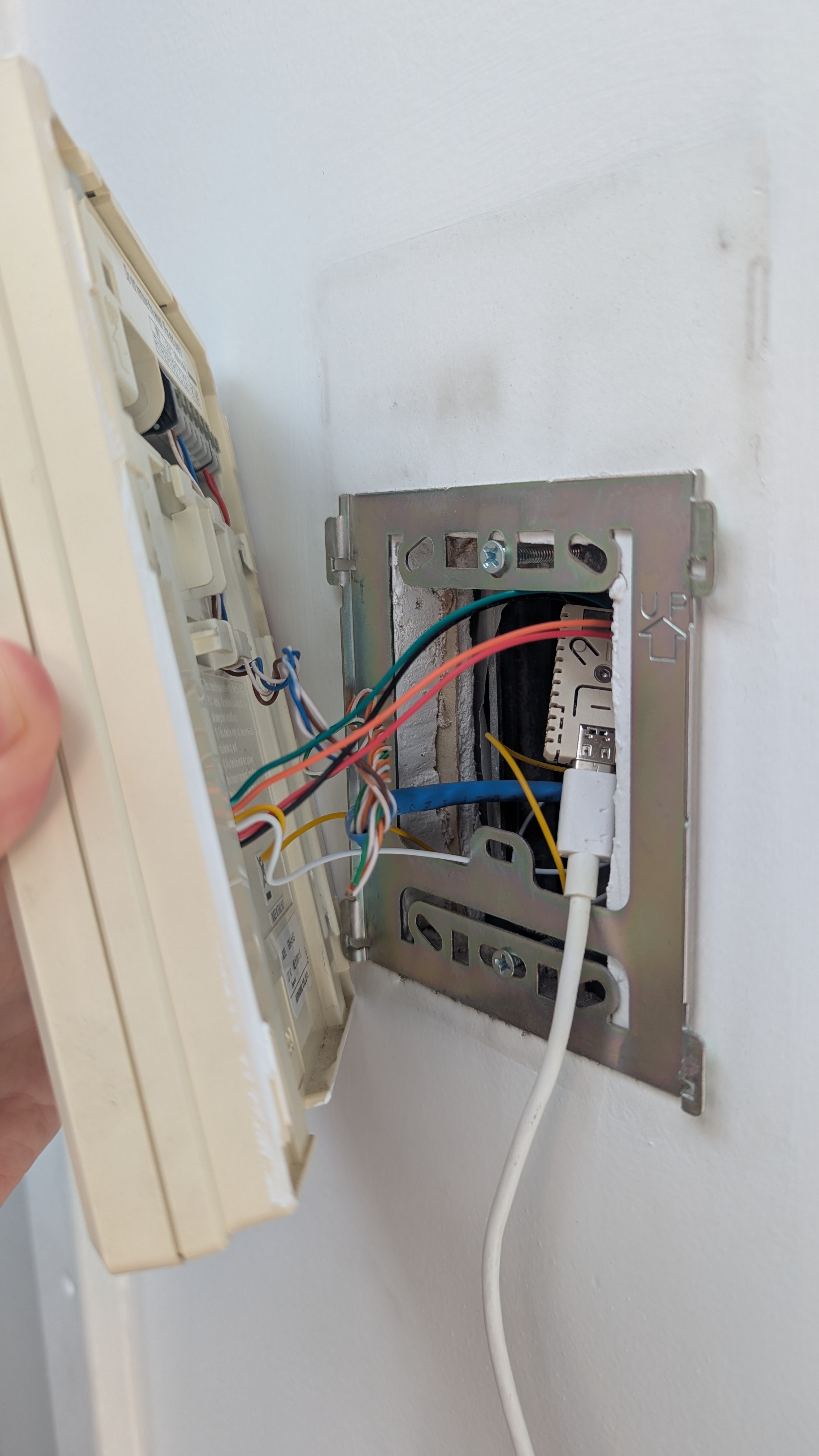 ESP32 board behind intercom unit